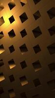 Vertical video - a rotating pattern of golden isometric cubes. Full HD and looping abstract background.