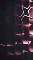 Vertical video - dark abstract geometric background with a pattern of rotating extruded hexagon shapes. Full HD and looping motion background animation.