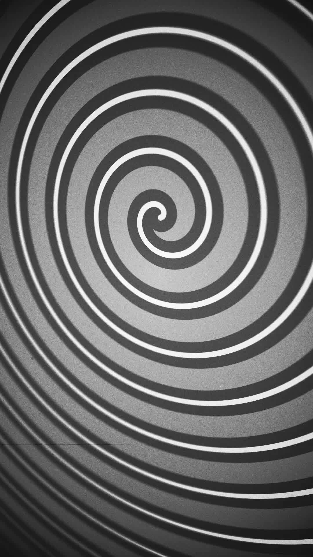 Vertical video - retro vintage hypnotic circus style spiral motion