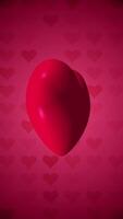 vertical vídeo - grande lustroso corazón giratorio en estampado corazones antecedentes esta texturizado romántico San Valentín día movimiento antecedentes diseño es hd y un sin costura bucle. video