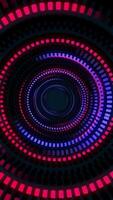 Vertical video - a circle of blinking neon colored blue and red glowing digital data lights technology background.