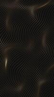 Vertical video - gently flowing shiny golden wavy lines. Full HD and looping abstract wave pattern background animation.