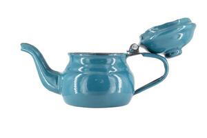 Vintage metal old blue kettle isolated on white background photo