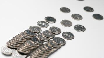 collection of Indonesian rupiah coins on a white background photo