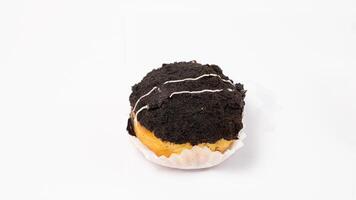 photo of donuts isolated in white background. donuts with chocolate powder on top