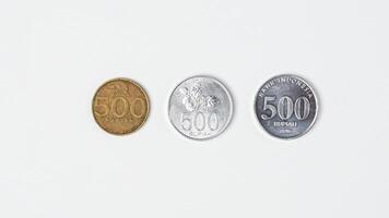 three variants of Indonesian rupiah coins. photo