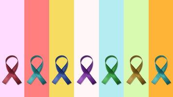 World cancer day background. Colorful ribbons, and colorful backgrounds photo