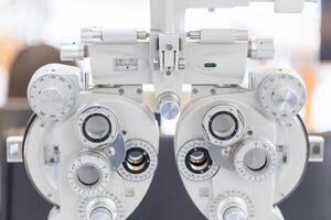 Selective focus of phoropter eyesight measurement testing machine in the optical shop photo