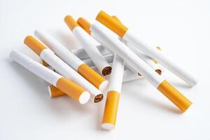 Cigarette, tobacco in roll paper with filter tube, No smoking concept. photo