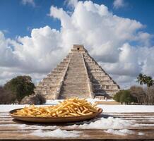 AI generated French fries in a plate on the snow in Chichen Itza photo