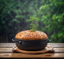 ai generado recién horneado hecho en casa un pan en de madera mesa con verde bokeh antecedentes foto