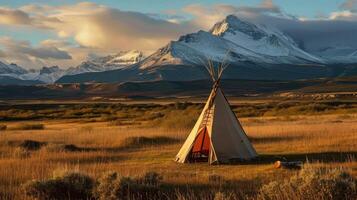 AI generated Teepee with mountains in background. photo