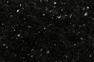 Snowfall on a black background. a design element. Snow background photo