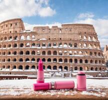 AI generated Pink lipstick and Colosseum in winter, Rome, Italy photo
