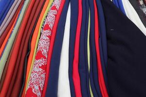 Samples of cloth and fabrics in different colors photo