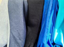 Samples of cloth and fabrics in different colors photo