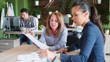 Middle age female business woman having a discussion with her managing partner. Caucasian business woman. video