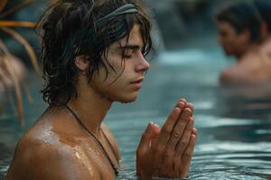 ai generado un hombre sentado en el agua practicando yoga , disfrutando meditación foto