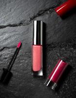 AI generated Lipstick gloss mockup on grange stone background, cosmetic mock up photo