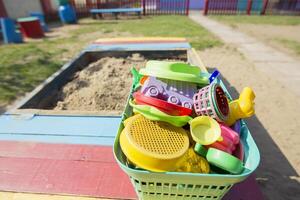 Children's sandbox. Forms for playing in the sand photo