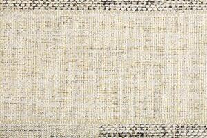 A piece of paper wallpaper with a matting or burlap pattern. Beige matting texture background. photo