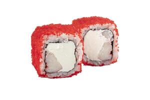 Sushi rolls boned in red artificial caviar on a white background close-up. photo