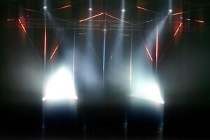 Stage lighting with laser illumination and puffs of smoke. Dark stage background. photo