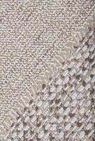 A piece of paper wallpaper with a matting or burlap pattern. Background vertical texture matting. photo