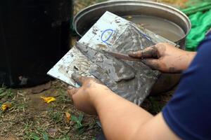 Learning outside the art classroom. Students learn about sculpting clay into geometric shapes. soft and selective focus. photo