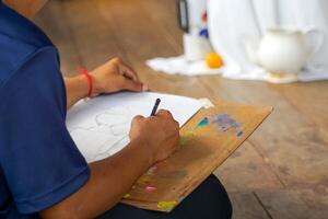 Students draw pictures of objects with various shapes. Placed as a model on the table for students to practice drawing light and shadow. soft and selective focus. photo