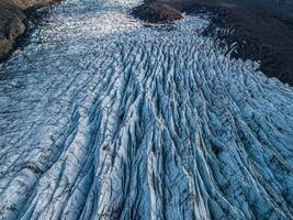 Svnafellsjkull Glacier in Iceland. Top view. Skaftafell National Park. Ice and ashes of the volcano texture landscape, beautiful nature ice background from Iceland photo