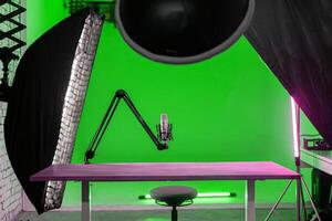 Modern green photo studio interior with professional equipment. Photography and design concept. 3D Rendering