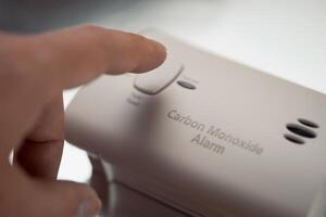 studio shot of carbon monoxide detector photo