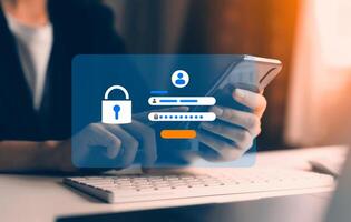 cyber security concept, man's hand using a smartphone Log in to applications via fingerprint scanning. It is the security of the information. photo