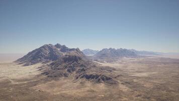 An aerial view of a mountain range in the desert video