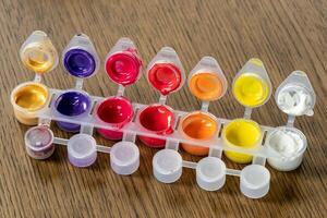 Palette mix watercolors. Children's watercolor paints. Colorful watercolor box. photo