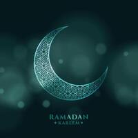 ramadan kareem background with crescent moon on bokeh background vector