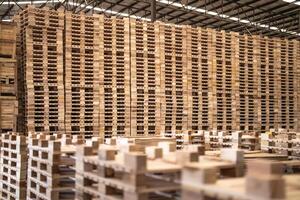 background of pattern wood section. Grid of wood squares. the raw of material timber on stack. photo