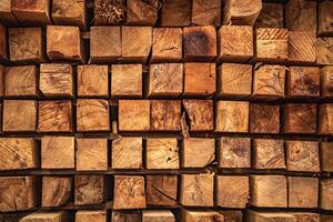 background of pattern wood section. Grid of wood squares. the raw of material timber on stack. photo