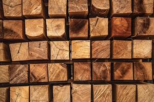 background of pattern wood section. Grid of wood squares. the raw of material timber on stack. photo