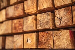 background of pattern wood section. Grid of wood squares. the raw of material timber on stack. photo