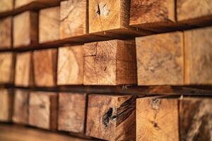 background of pattern wood section. Grid of wood squares. the raw of material timber on stack. photo