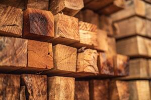 background of pattern wood section. Grid of wood squares. the raw of material timber on stack. photo