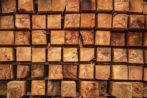 background of pattern wood section. Grid of wood squares. the raw of material timber on stack. photo