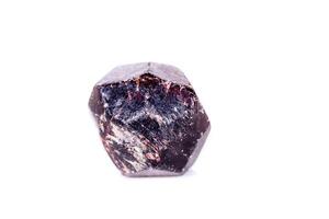 Macro of a mineral garnet stone on a white background photo