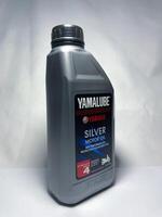 Surakarta, Indonesia, 2023 - Yamalube Motor Oil, semi synthetic API SJ for motorcycle 4T 800ml. Plastic bottle for engine oil. photo