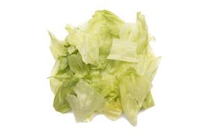 Pieces of lettuce, isolated on white background. Lactuca sativa, commonly known as lettuce, is a herbaceous plant native to semi-temperate regions that is grown for food. photo