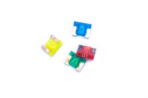 Old Car fuse colorful color on white background micro size use for protection in electric system of car photo