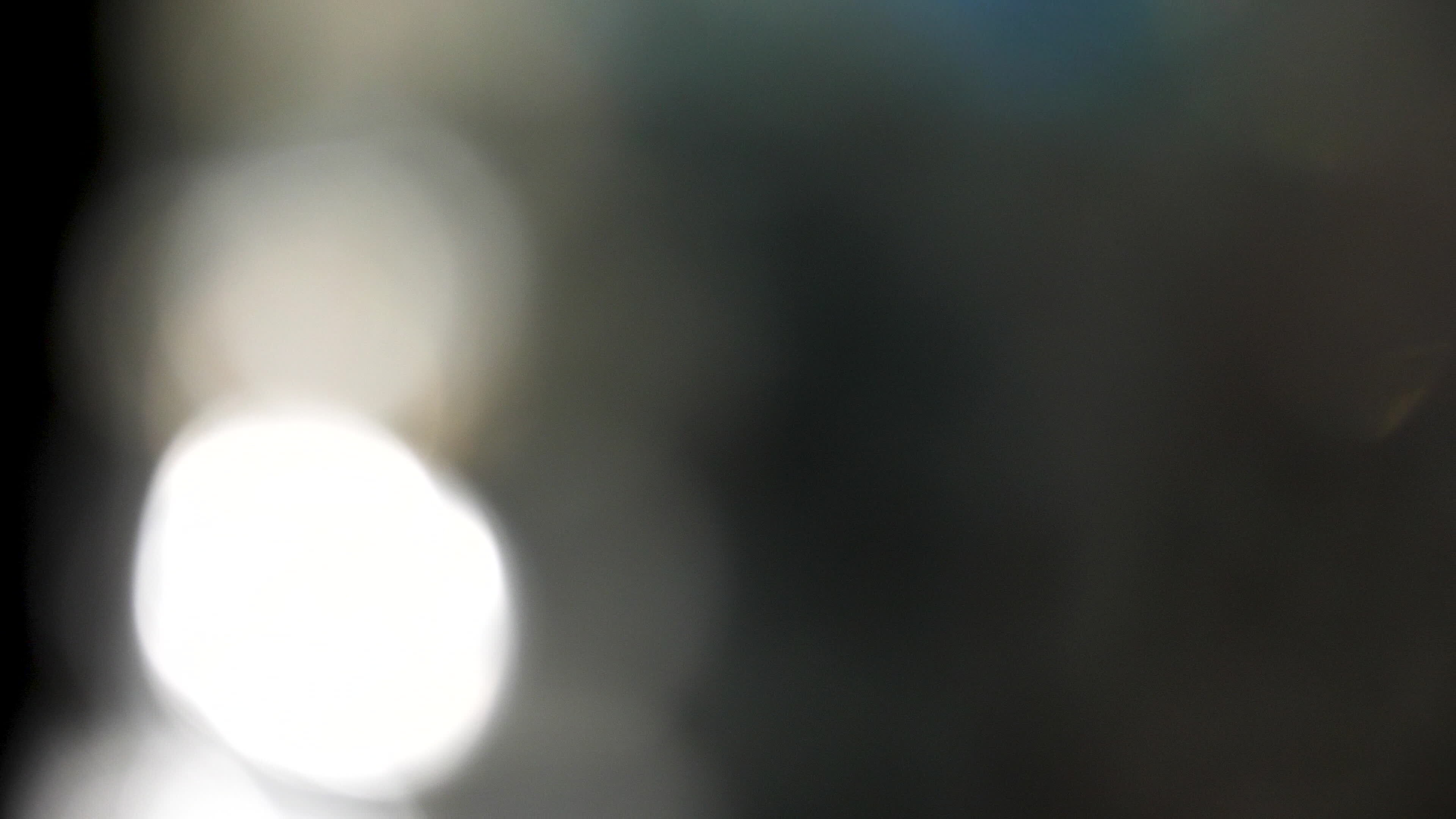 Pretty sparkles flashing nicely. 4k footage of glittery lights on black