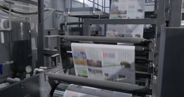 Industrial printing house. Printing presses in operation video